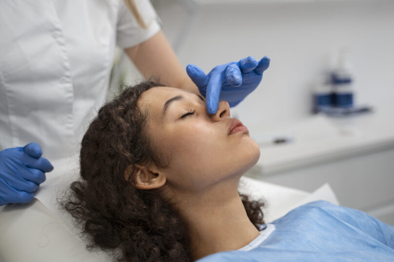 patient-undergoing-microneedling-procedure patient-undergoing-microneedling-procedure